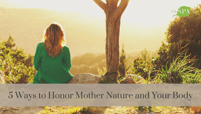 Woman meditating outdoors honoring Mother Nature