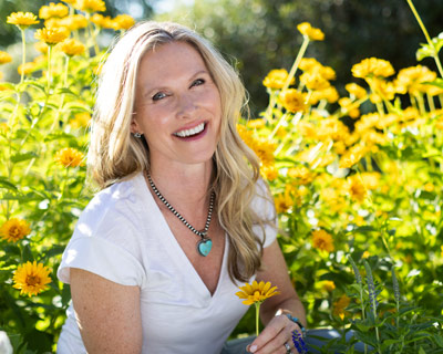 Dr. Cates with yellow flowers