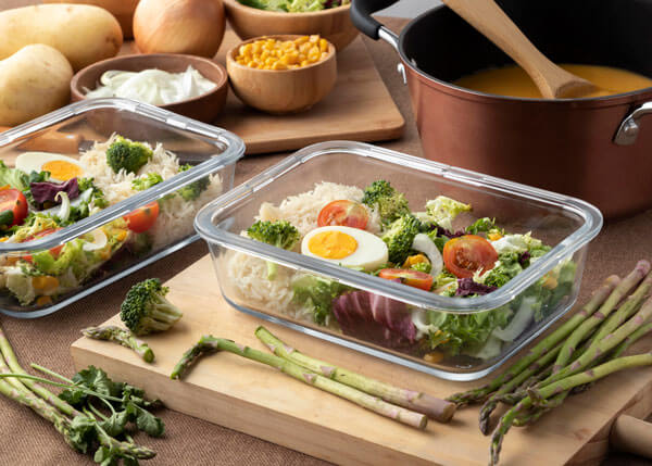 Glass food containers with eggs and veggies